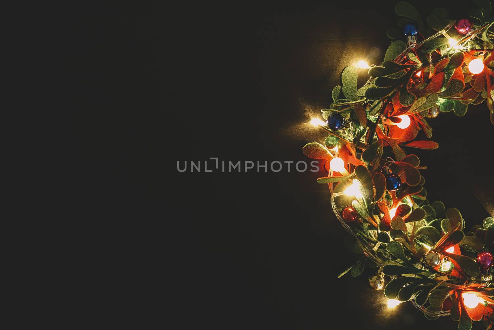 Greeting Season concept.Christmas wreath with decorative light o by everythingpossible