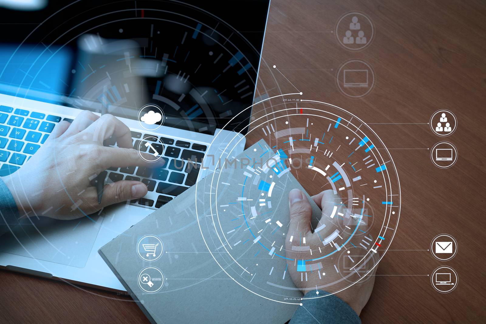 Hands of businessman using mobile phone in modern office with laptop and digital tablet computer in finance team meeting with VR icon diagram