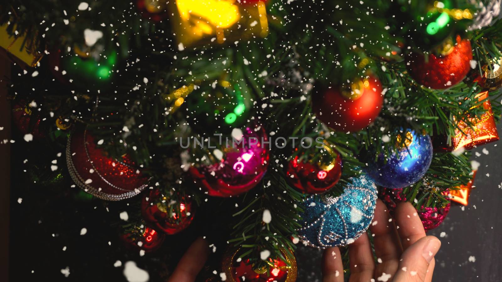 Greeting Season concept.close up of ornaments on a Christmas tre by everythingpossible