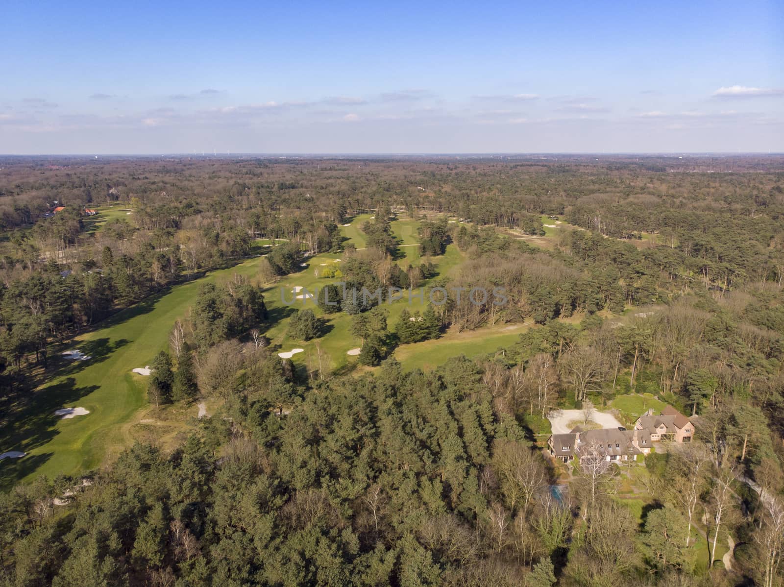 Kapellen, Antwerp, April 2020: Aerial view on a golf court in the forest