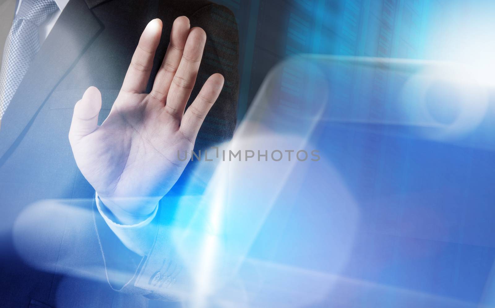 businessman hand pressing a touchscreen button on server background 