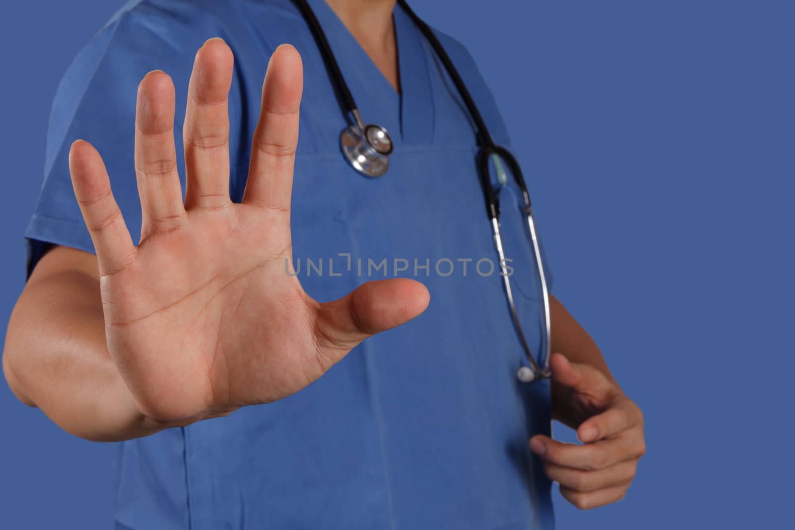 success smart medical doctor working with blue background by everythingpossible