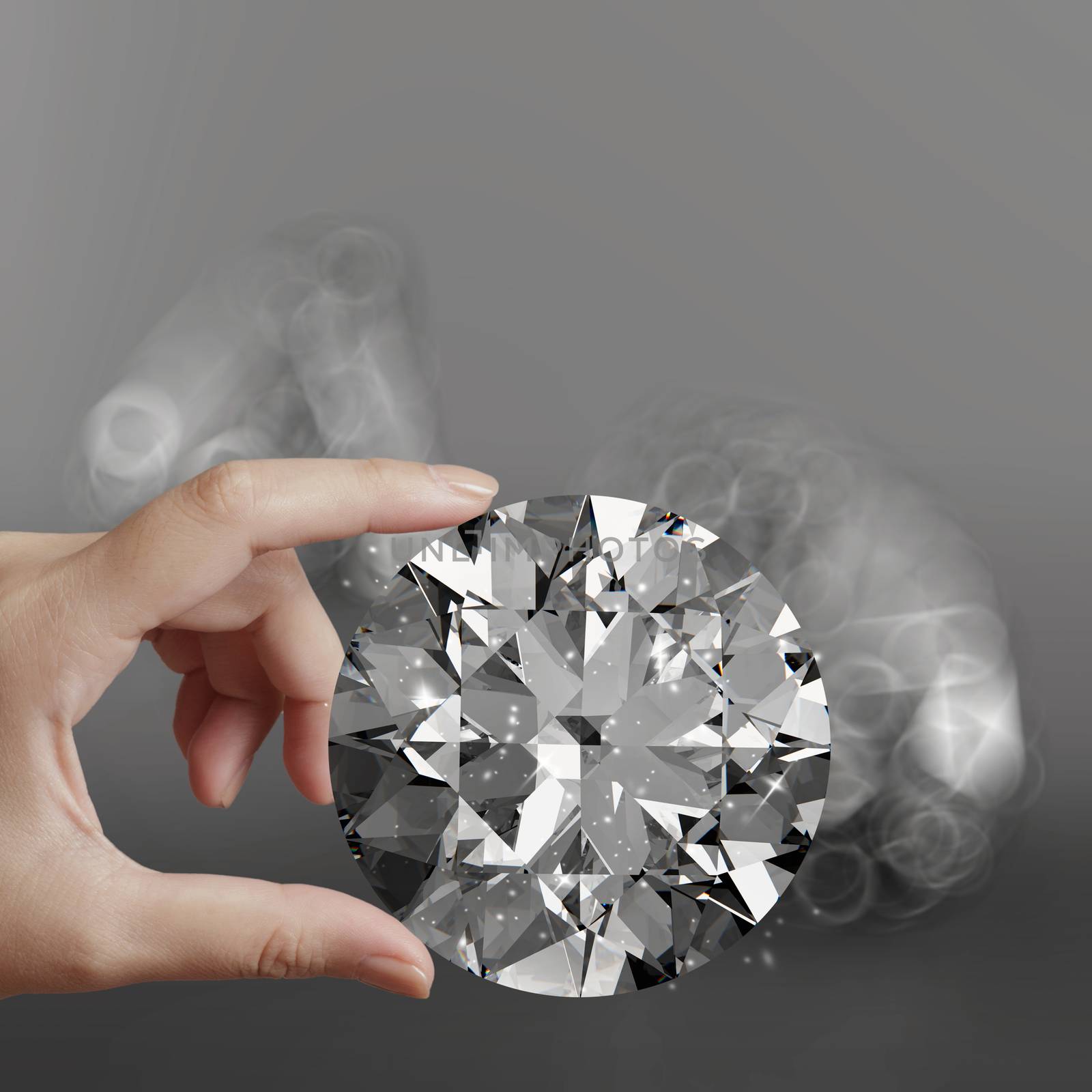 hand holding 3d diamond over grey background