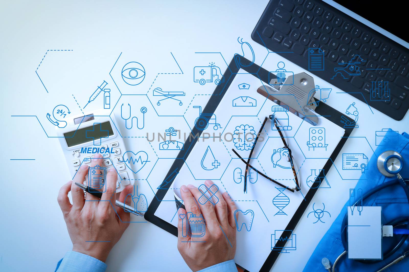 top view of Healthcare costs and fees concept.Hand of smart doct by everythingpossible