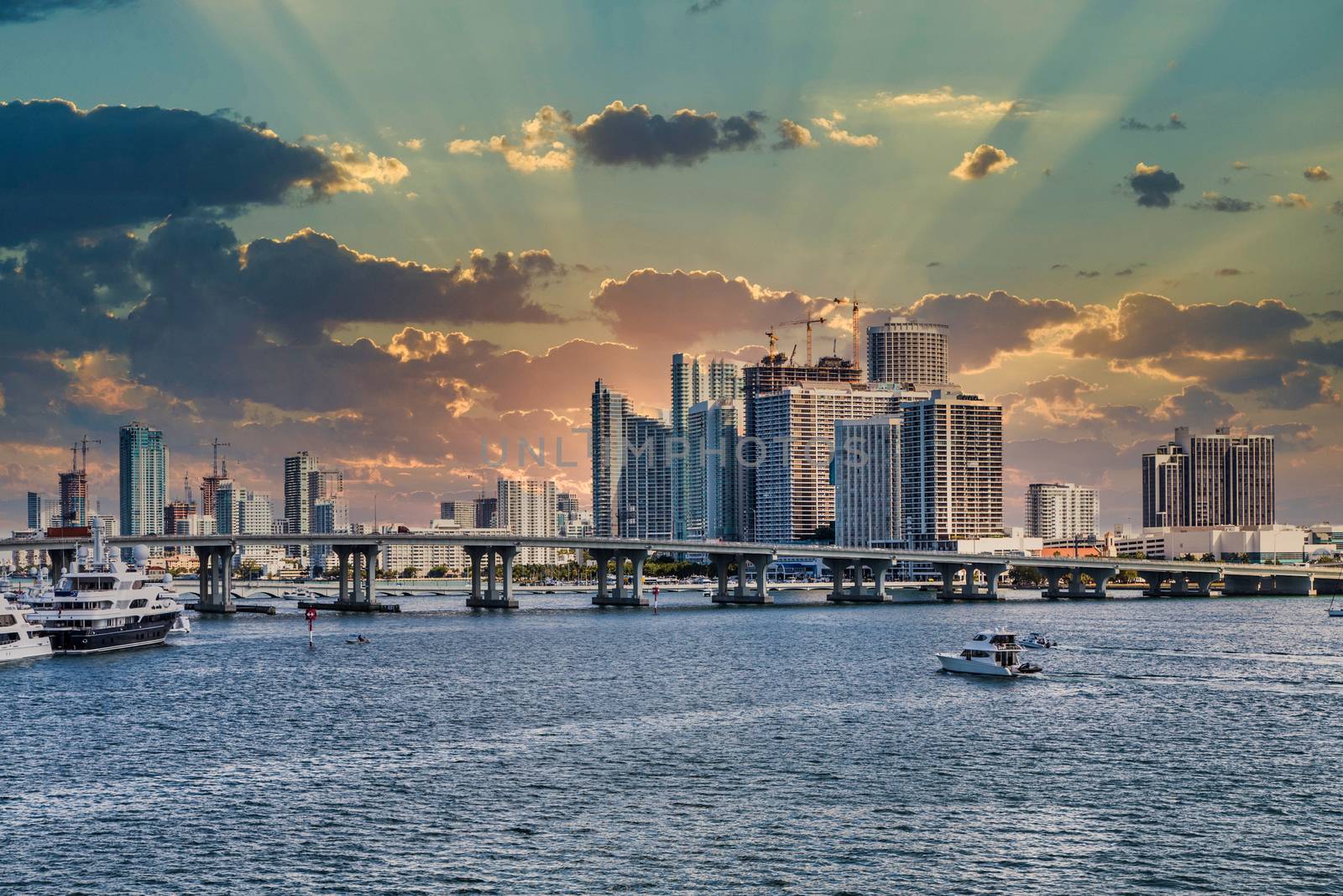 Miami Skyline Across Biscayne Bay at Sunset by dbvirago