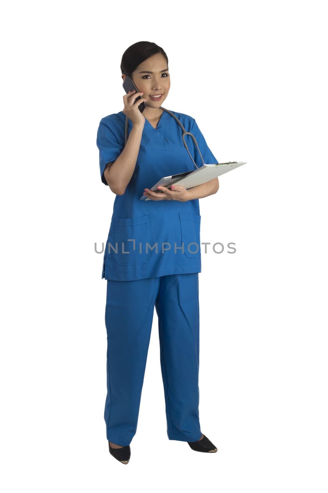 Busy female doctor in blue uniform standing on white background. by pandpstock_002