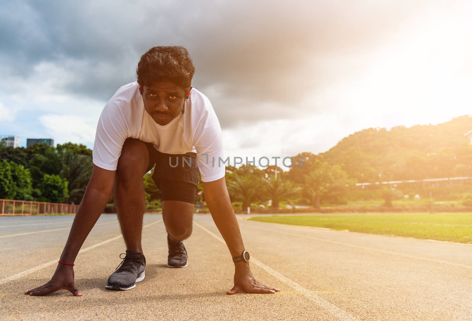 Asian young athlete sport runner black man wear feet shoe active ready to start running training at the outdoor on the treadmill for a step forward, healthy exercise workout, closeup face front