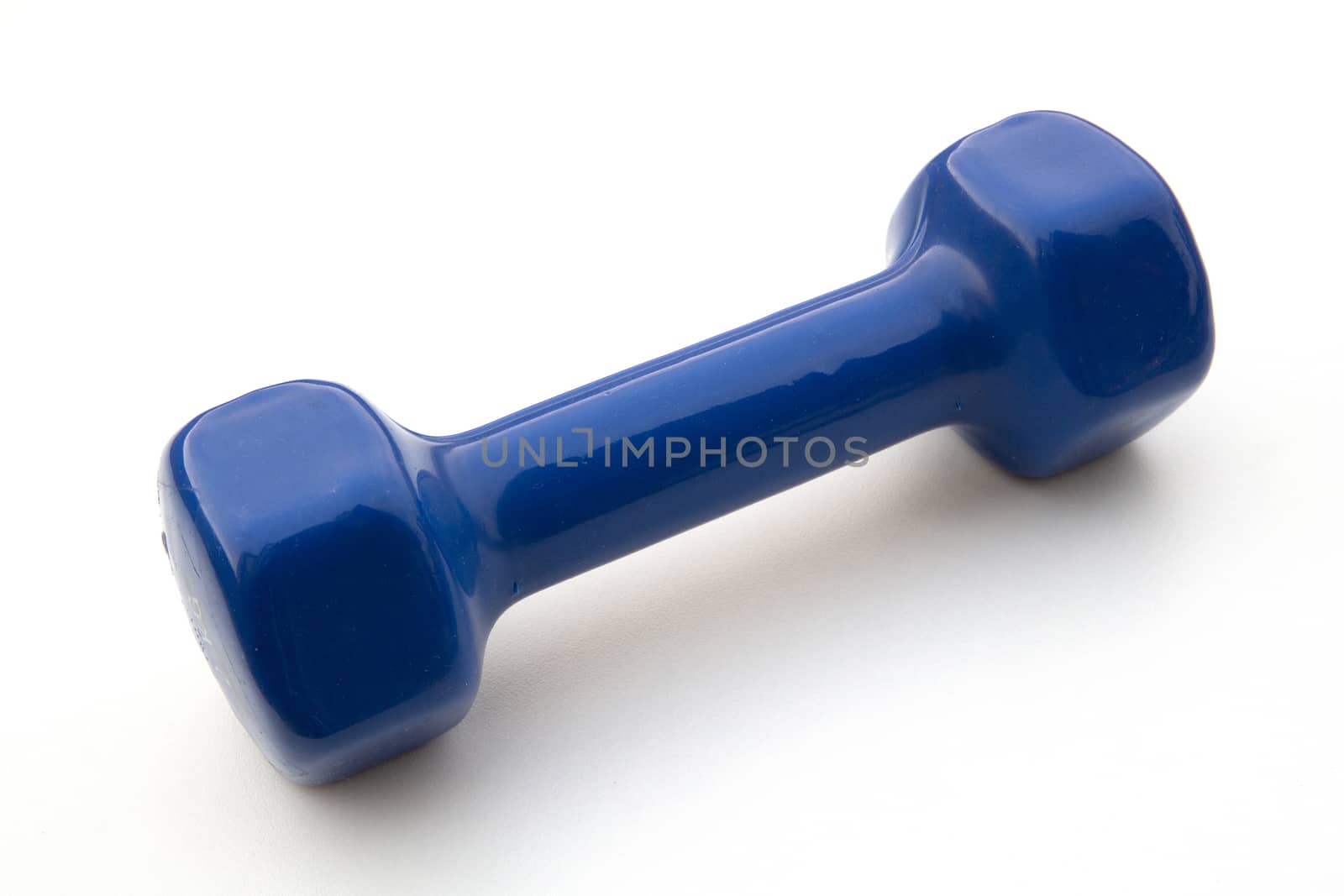 Blue Dumbell on white background. Exercising Equipment during lockdown and quarantine.