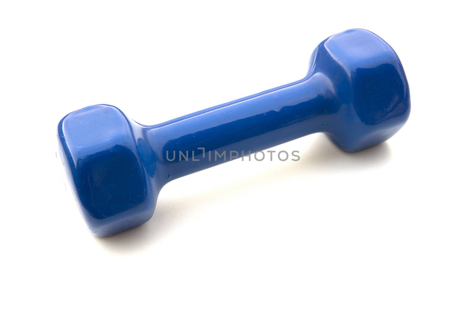 Blue Dumbell on white background. Exercising Equipment during lockdown and quarantine.