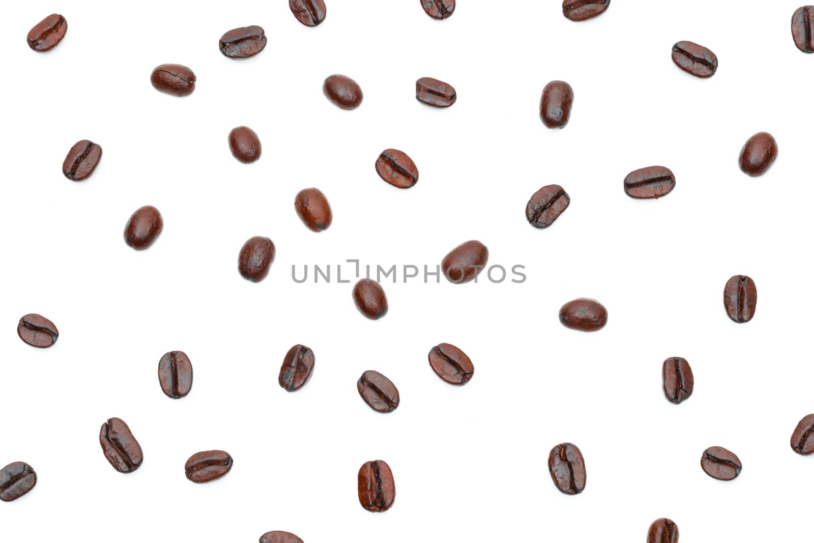 Roasted coffee beans in a white background