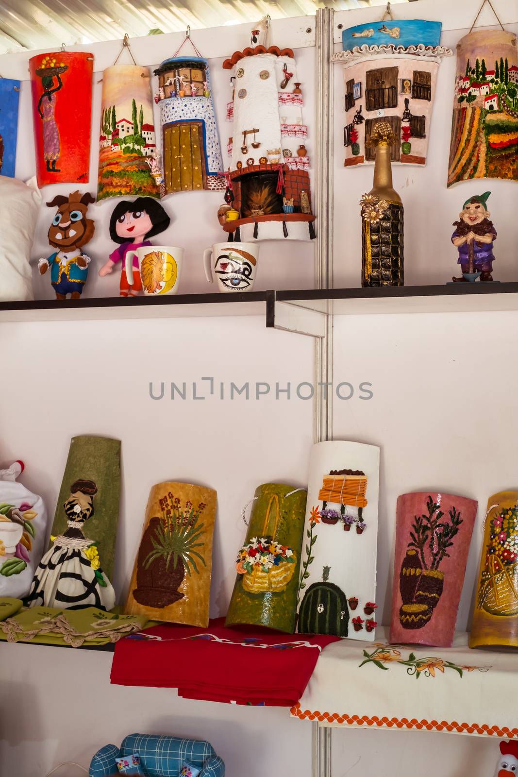 Malaga, Spain - May 18, 2018. Handicraft store with Spanish souvenir in Malaga city, Spain.