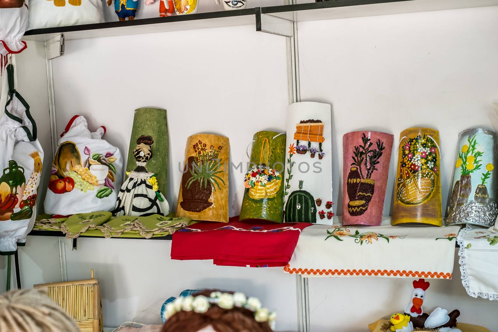 Handicraft store with Spanish souvenir in Malaga city, Spain. by Roberto