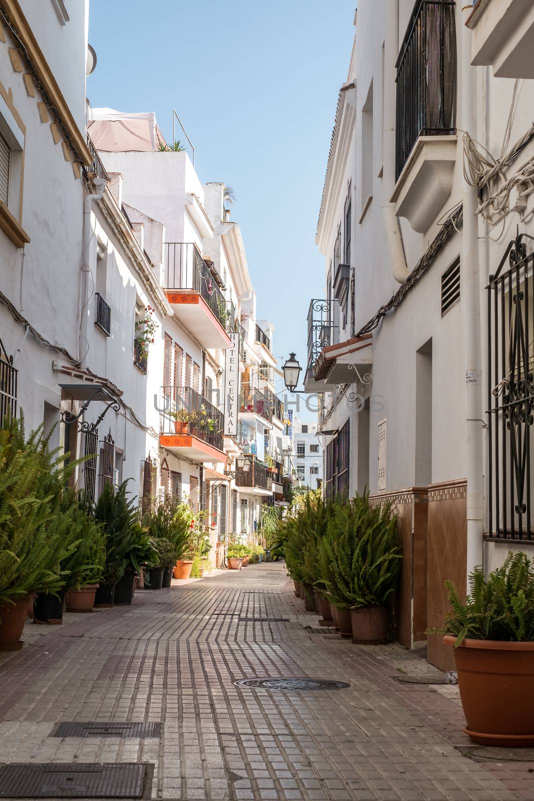 Marbella, Spain - June 27th, 2018. Typical old town street in Marbella, Costa del Sol, Andalusia, Spain, Europe