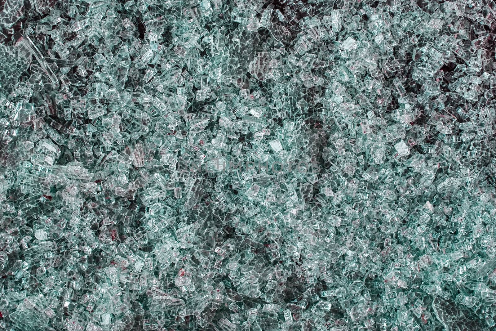 A pile of broken green glass