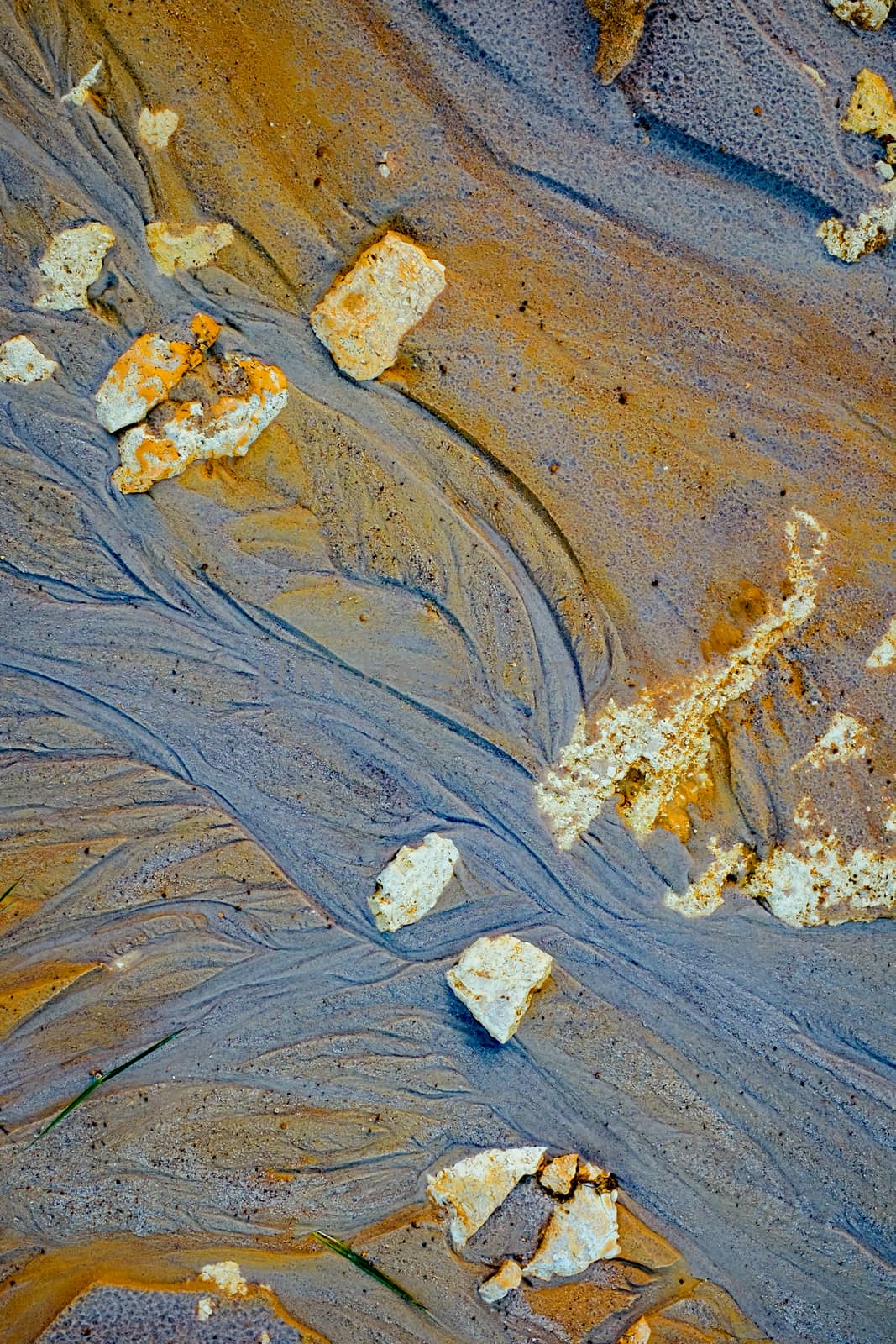 Abstract Blue and golden sand texture at kaolin mine