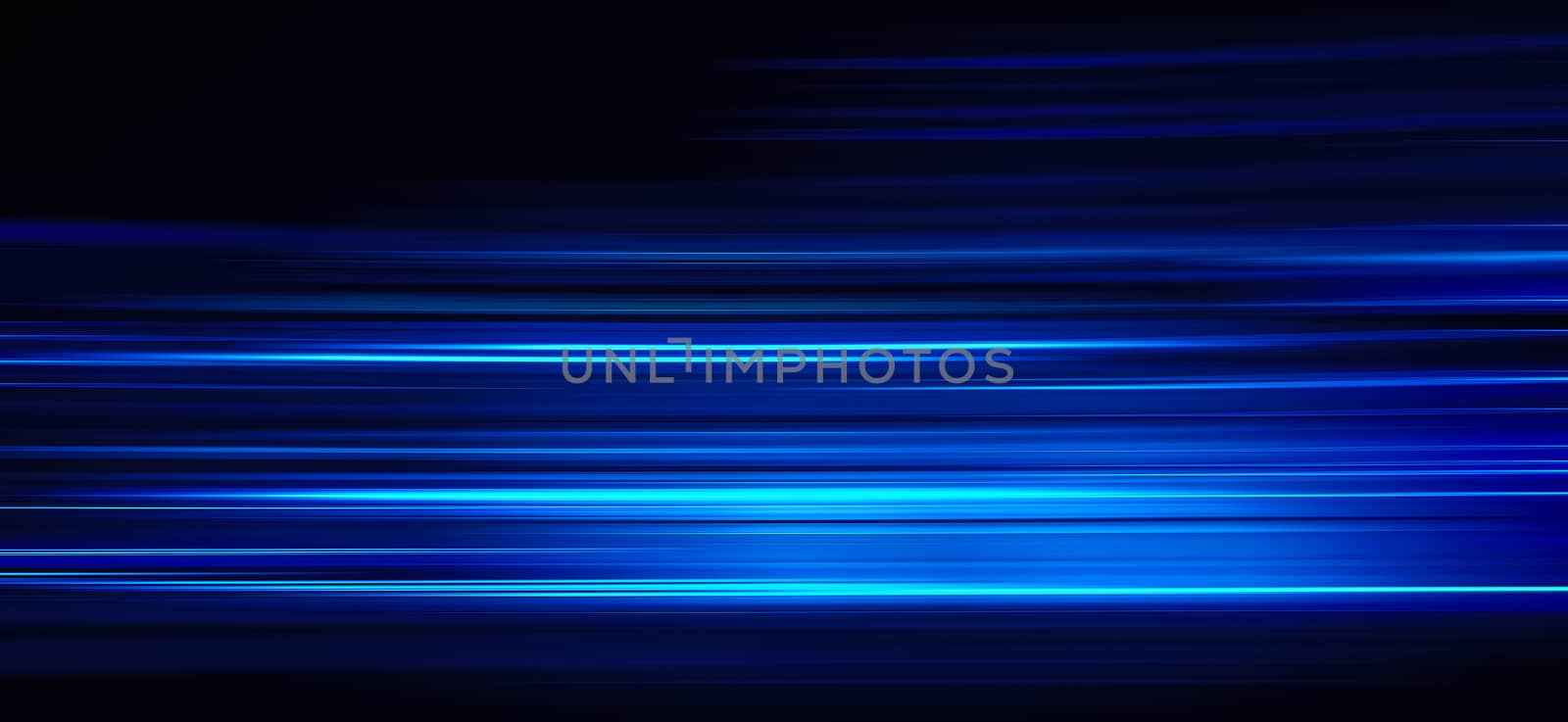 Abstract blue light trails on the dark background