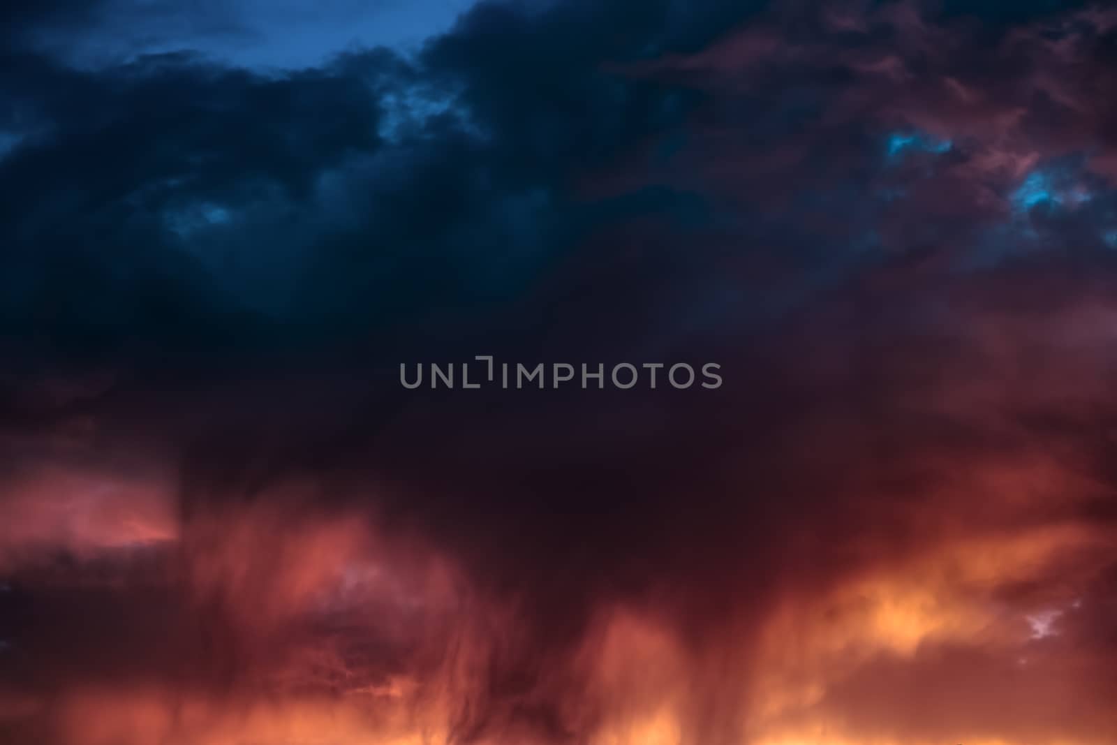 Amazing cloudscape on the sky at sunset time after rain