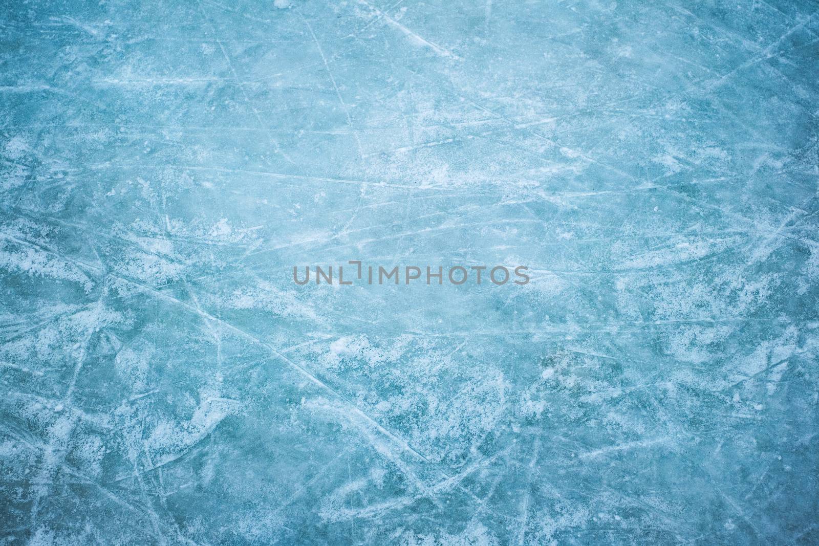 Blue ice in skate scratches, close view
