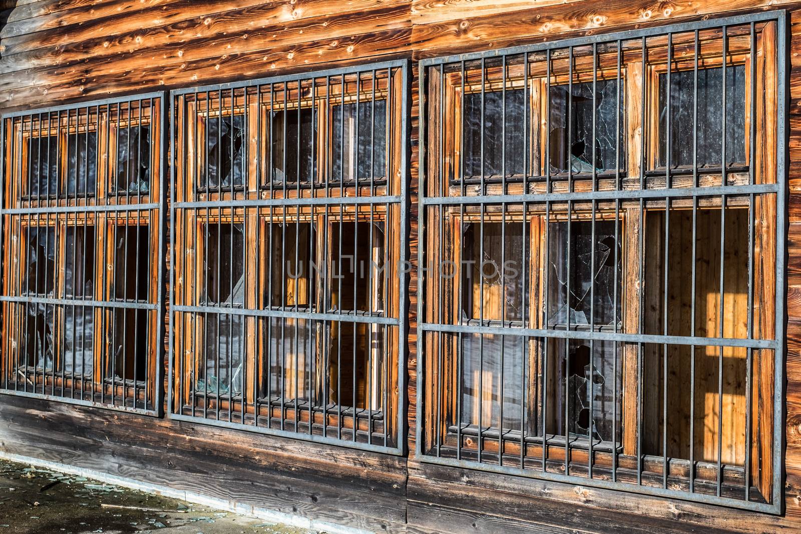 broken windows with metal grille