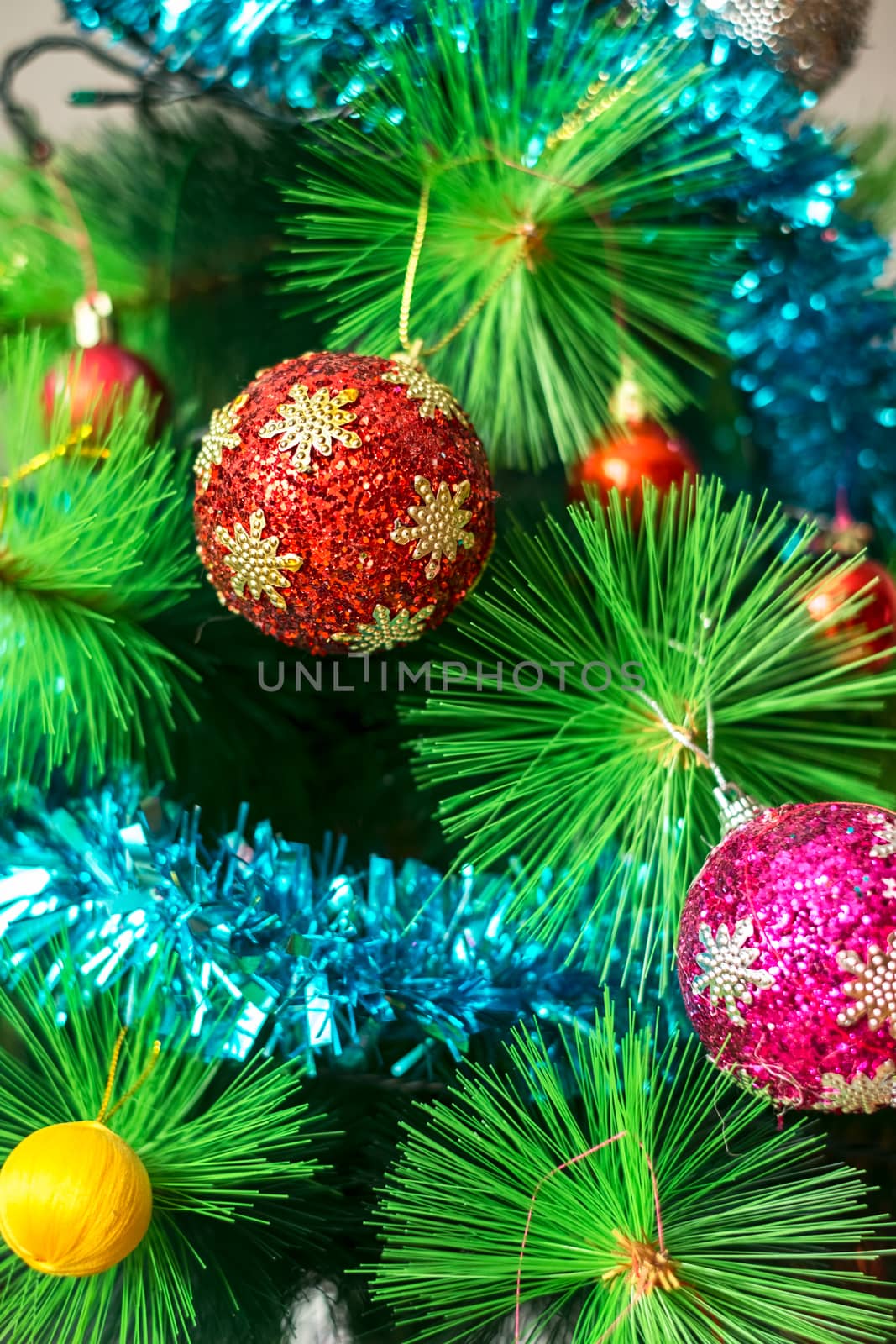 Christmas tree decorated with globles and tinsel