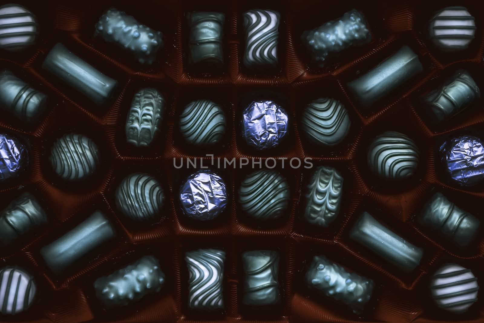 Chocolate candies arranged in the box