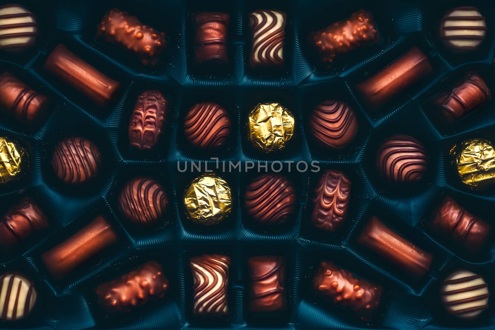 Chocolate candies arranged in the box