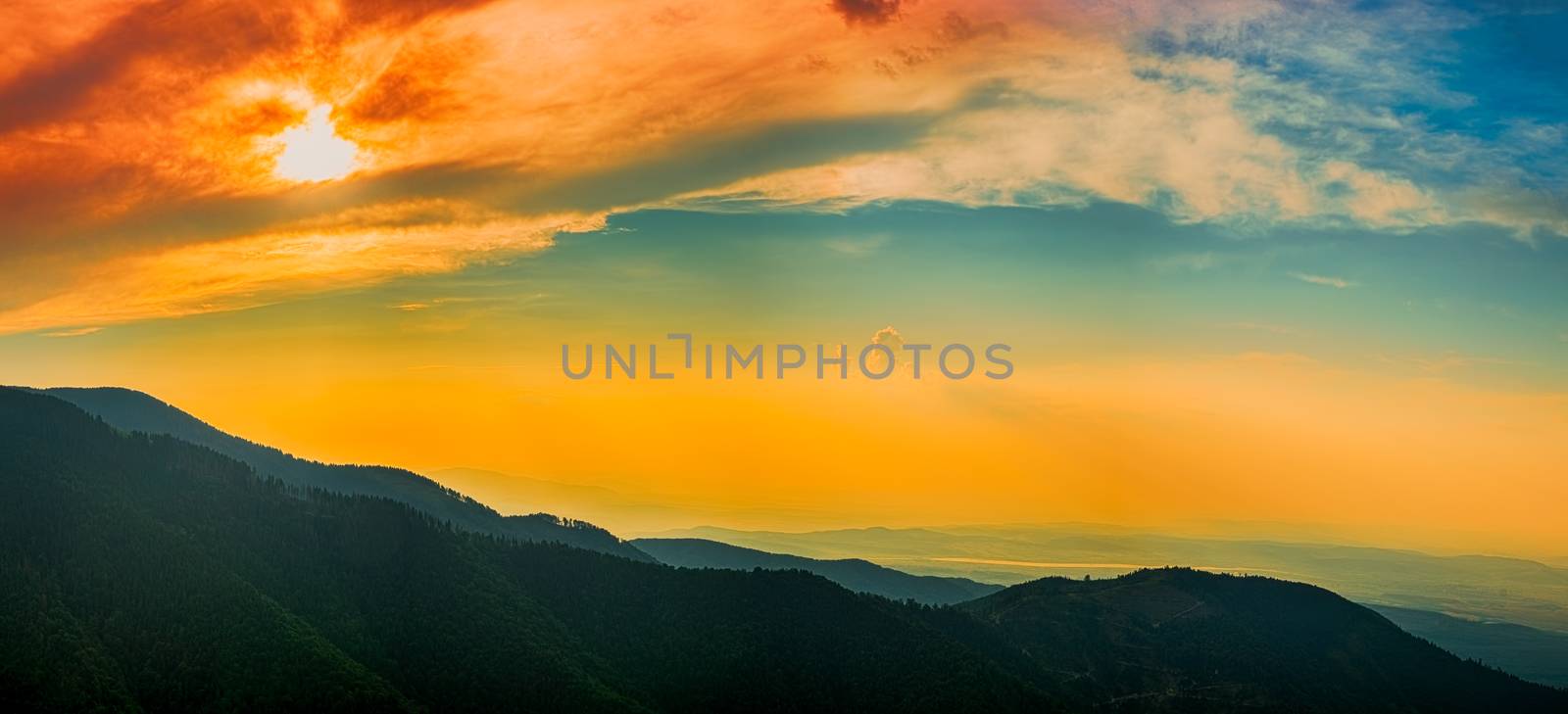 A play of colors at sunset in the mountains. Fagaras mountains, Romania, Sibiu county, Barcaciu cottage area,1550m