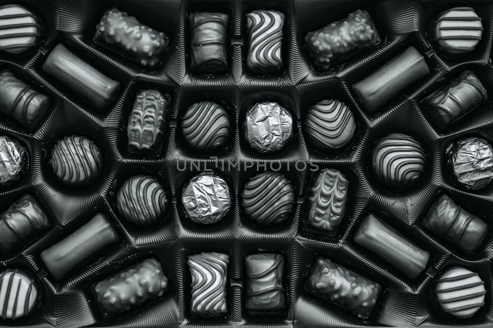 Golden chocolate candies in the box, top view