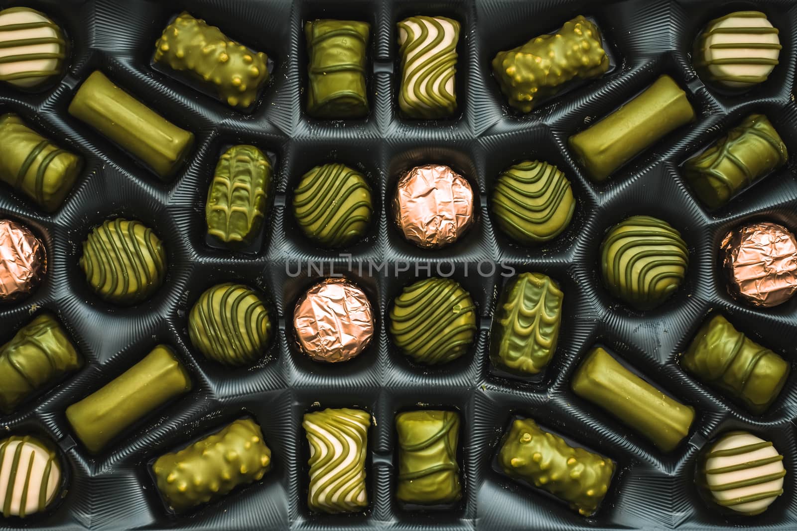 Green chocolate candies in the box