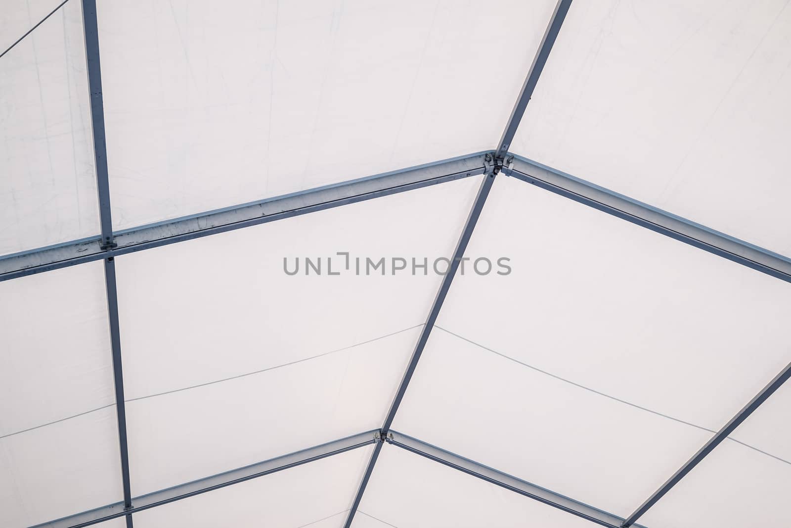 inside a clear blue span marquee (aluminium framework marquee)
