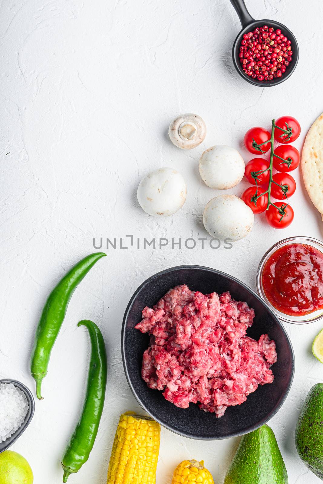 Mexican tacos with vegetables and meat. Ingredient for cooking, corn, meat Top view over white background with space for text