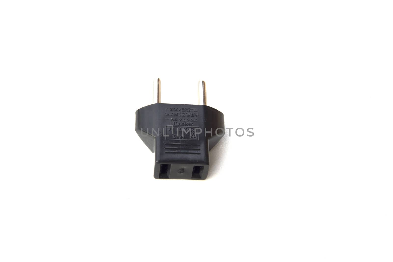 Black plug adapter on white background.