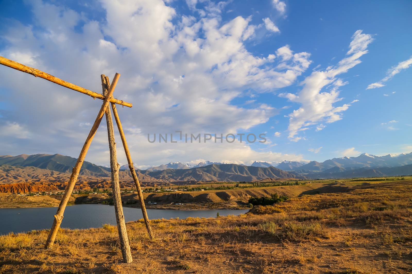 Issyk kul lake with mountains on background in Kyrgyzstan