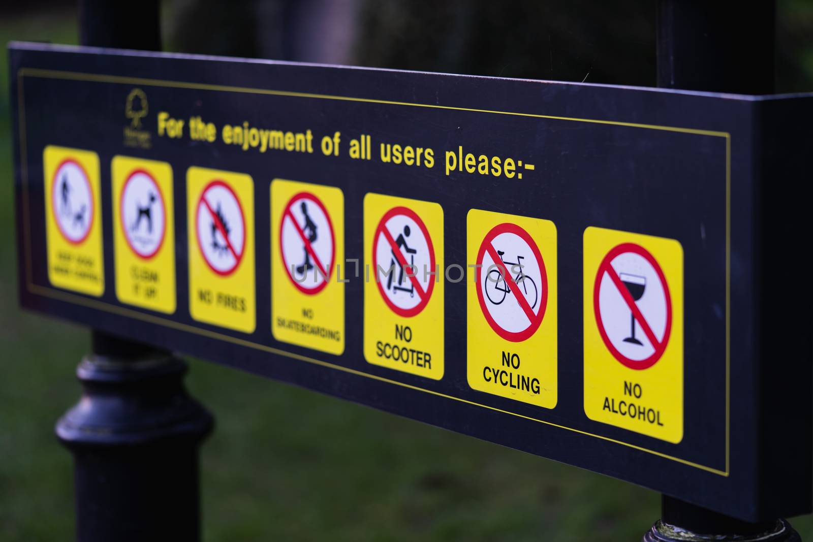 Public park rules sign in England