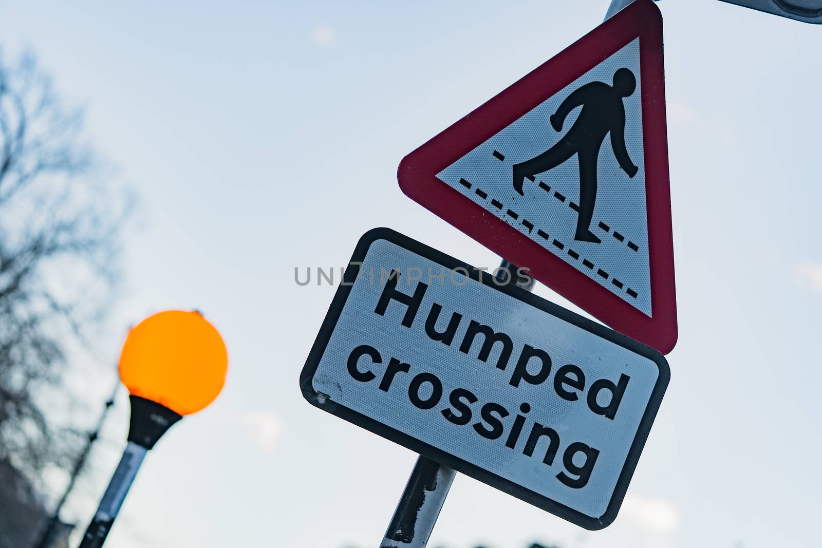 A humped crossing road sign in England