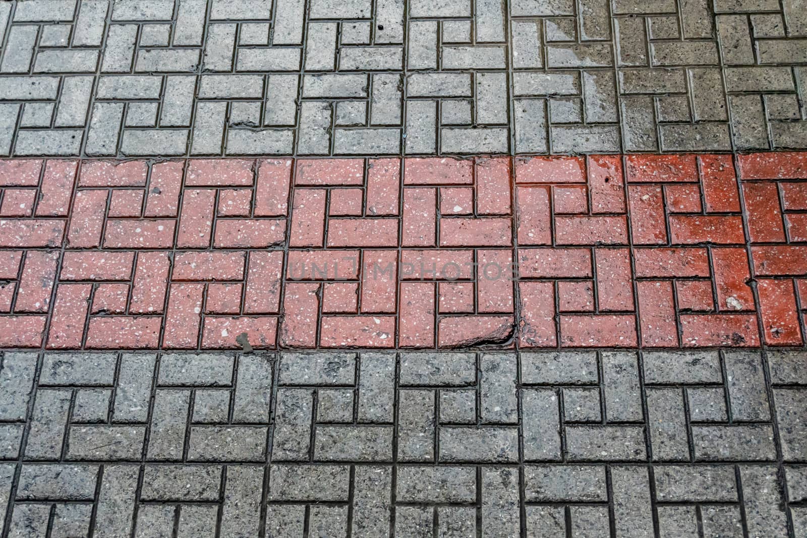 Pattern of the wet footpath floor.