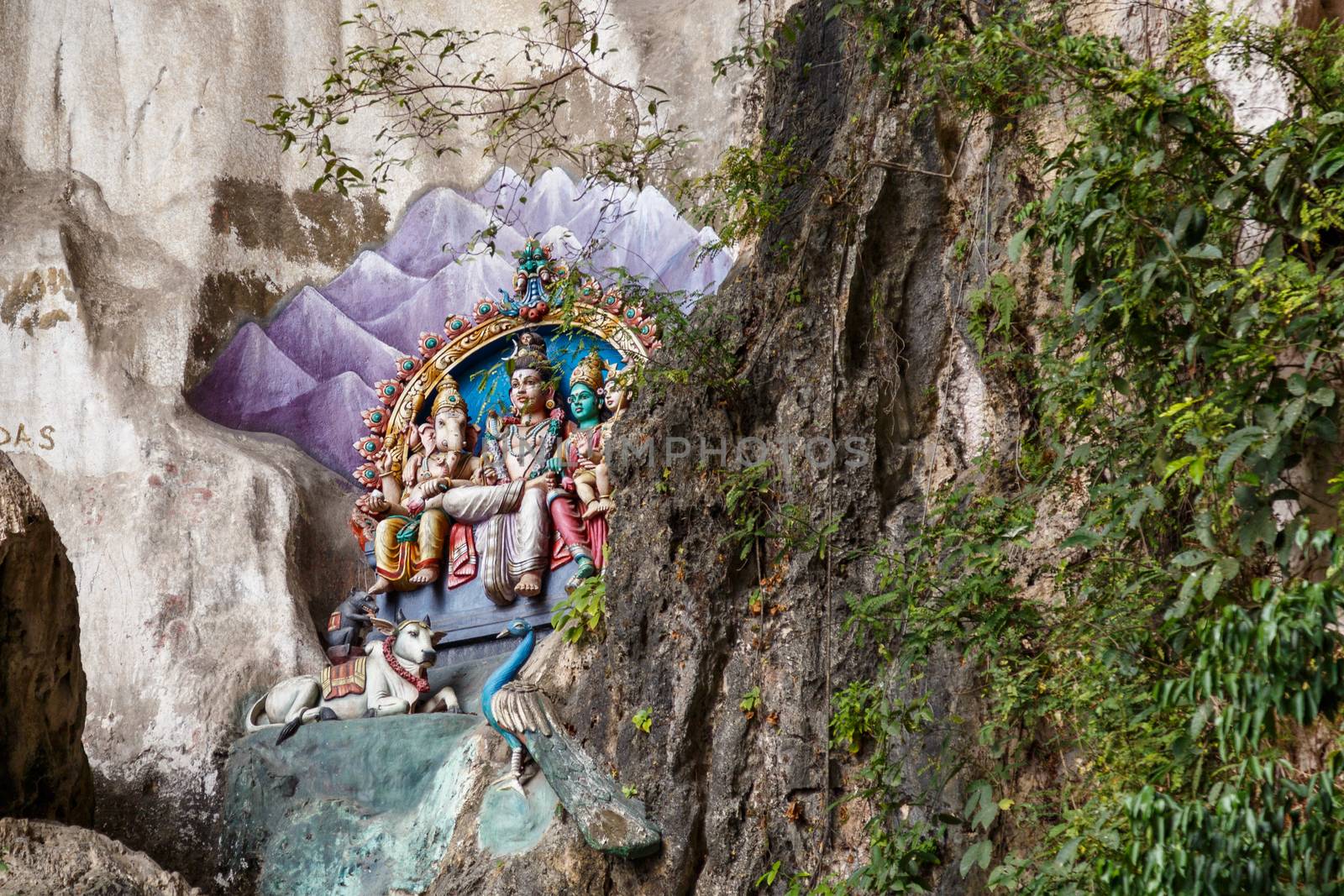 Colorful mural on a stone in Batu Cave in Malaysia, Hinduism temple