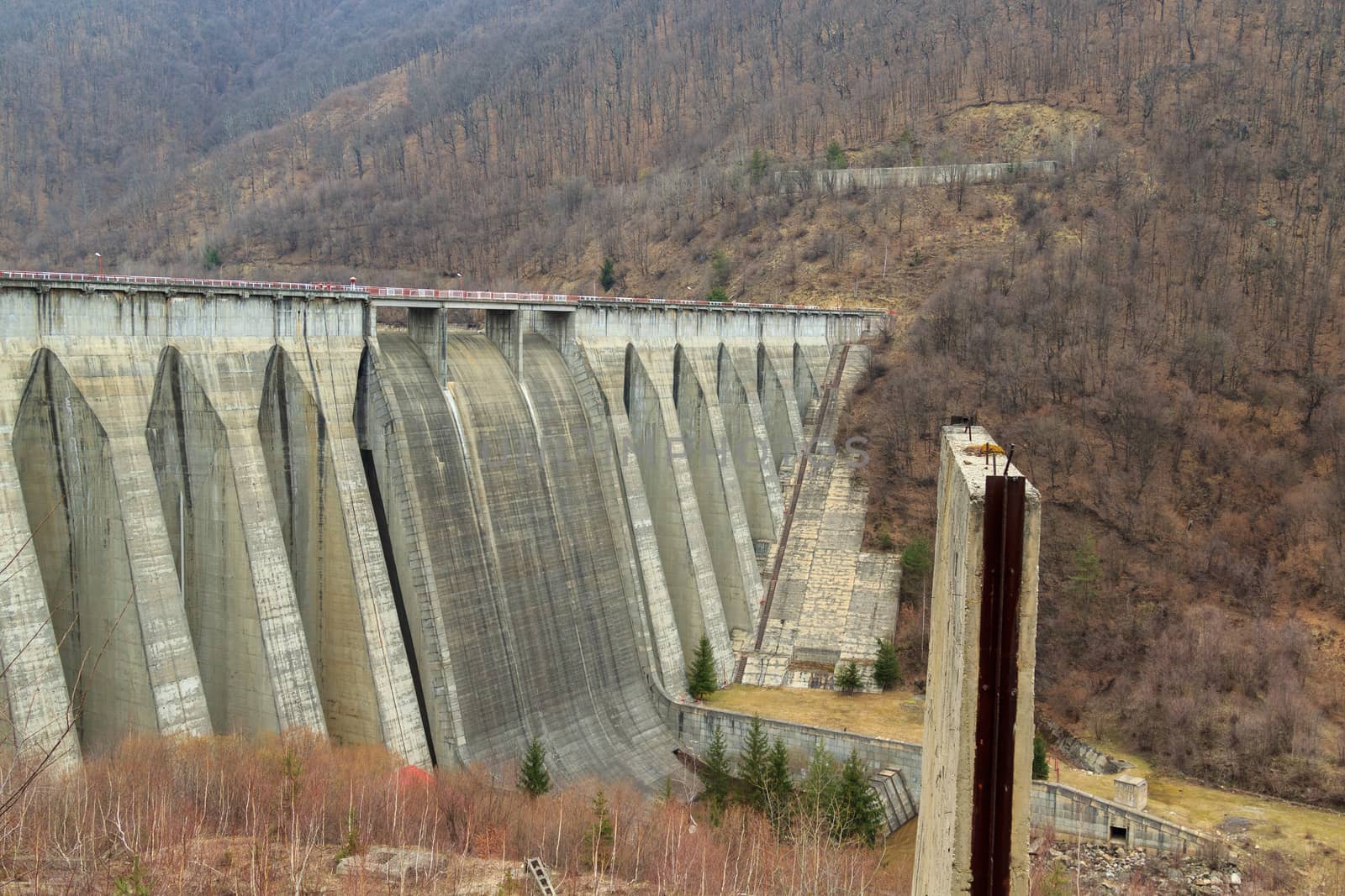 Gura Raului, Romania - CIRCA 2019: View of Gura Raului dam in Romania during autumn with beautiful colors. Concept of hydroelectric power and clean energy.