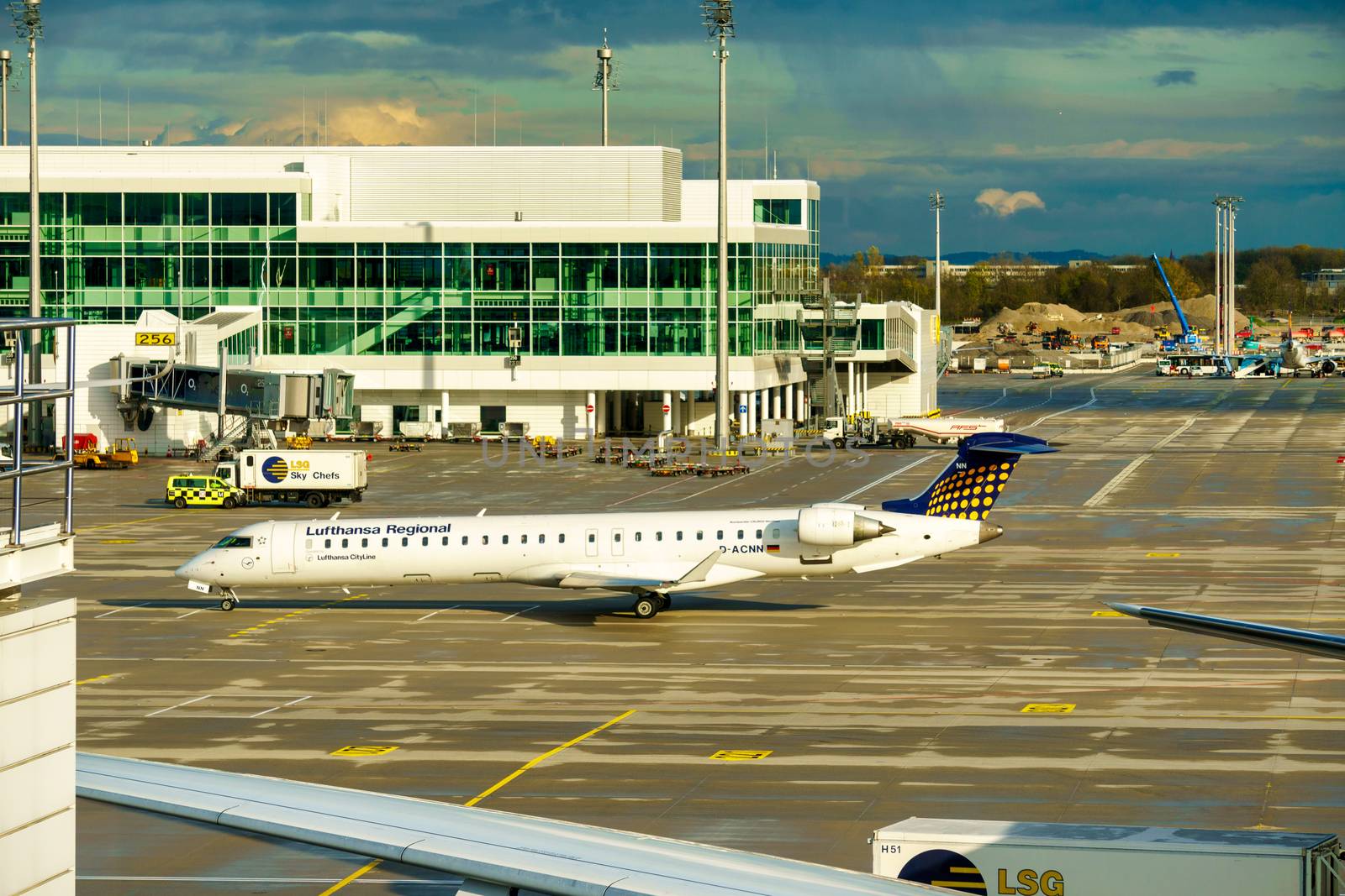 GERMANY, MUNICH - CIRCA 2020: Lufthansa Regional Airline Airplane getting ready for take off or landing at Munich airport. Travel concept