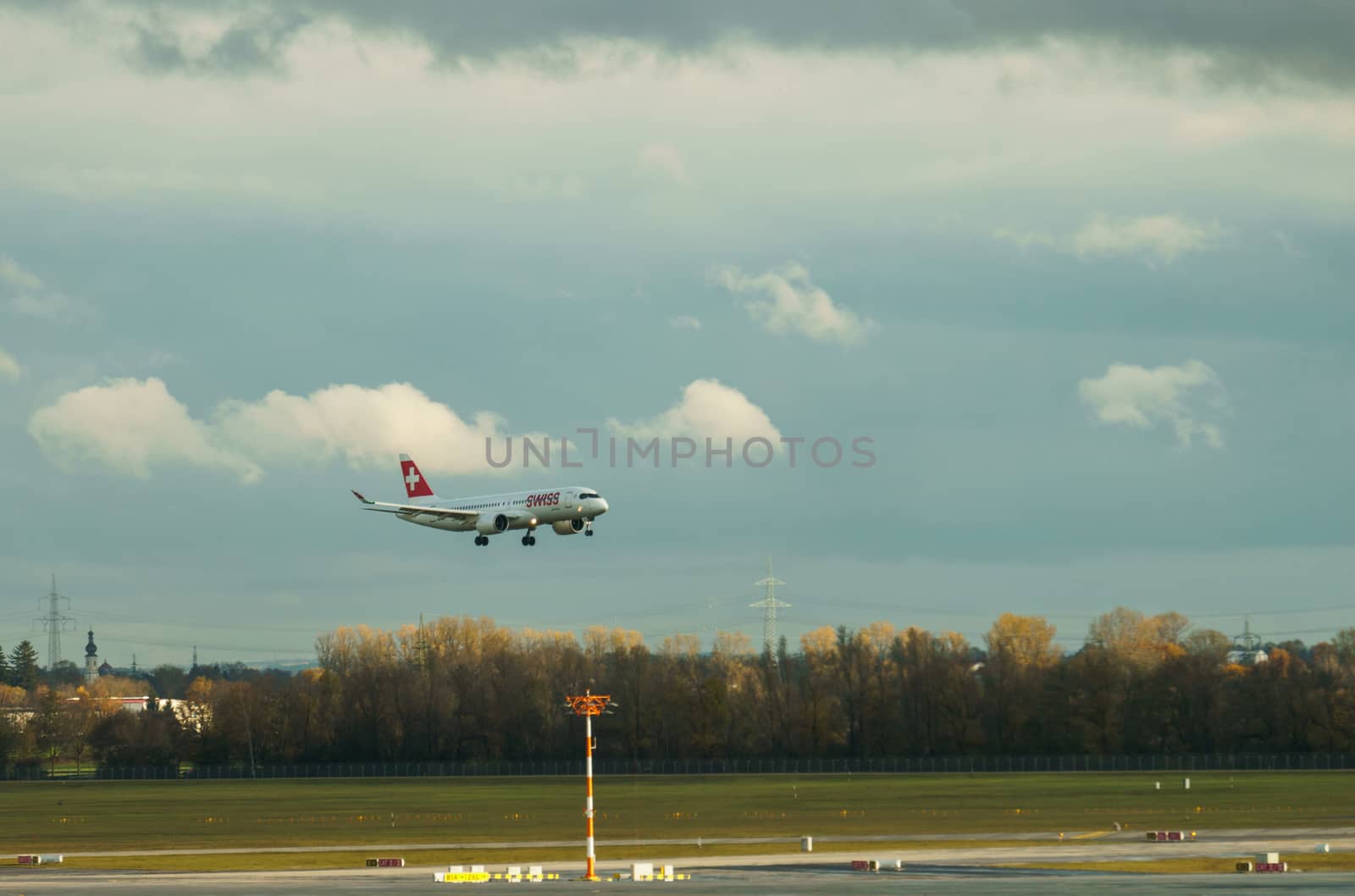 GERMANY, MUNICH - CIRCA 2020: Swiss Airline Airplane getting ready for landing at Munich airport. Travel concept