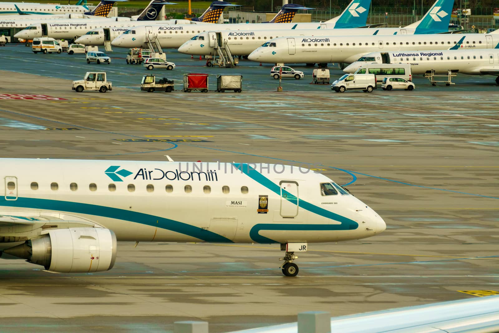 GERMANY, MUNICH - CIRCA 2020: Air Dolomiti Airline Airplane getting ready for landing or take off at Munich airport. Travel concept by dugulan