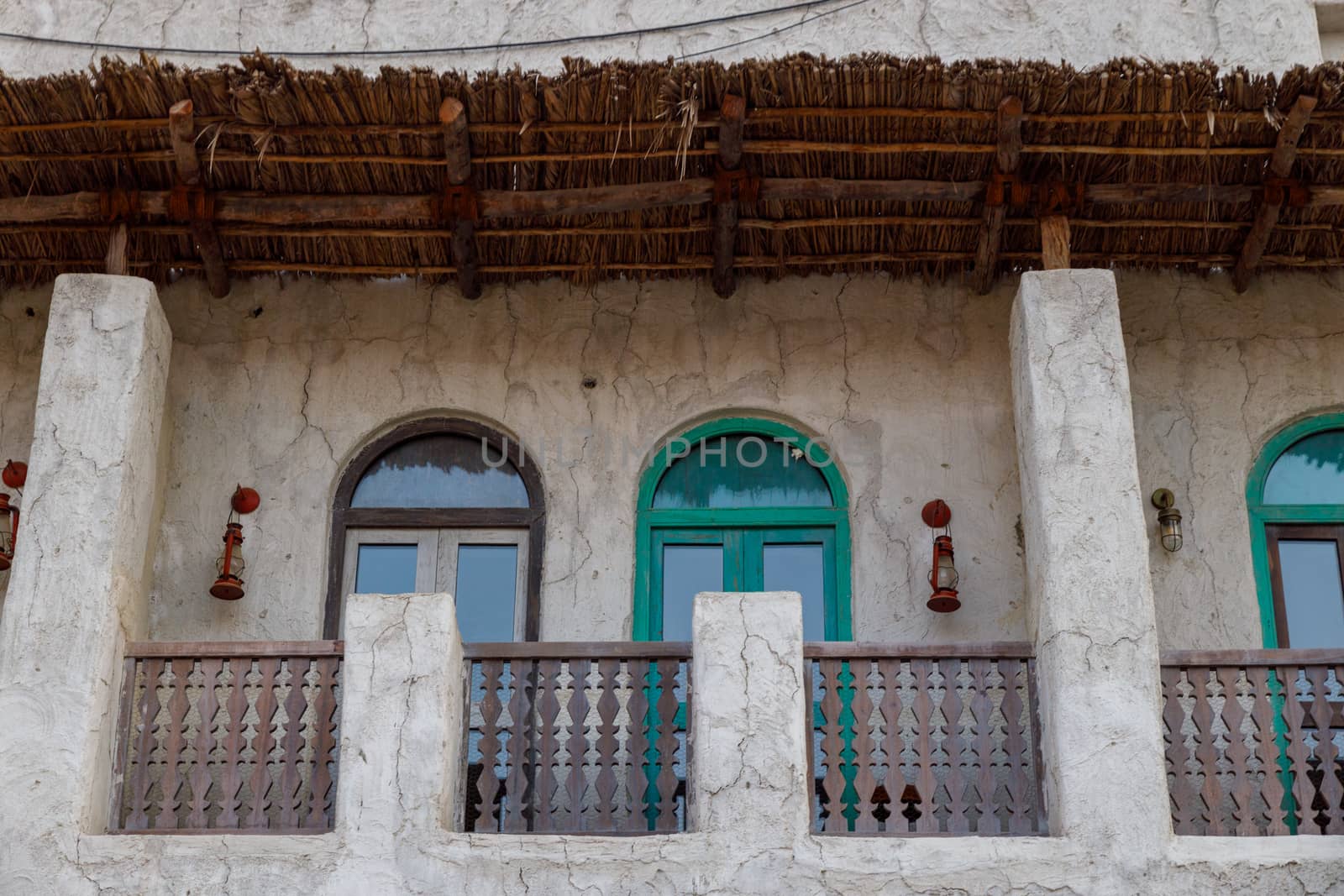 Facade of an old Arabic house. Old arabian architecture.