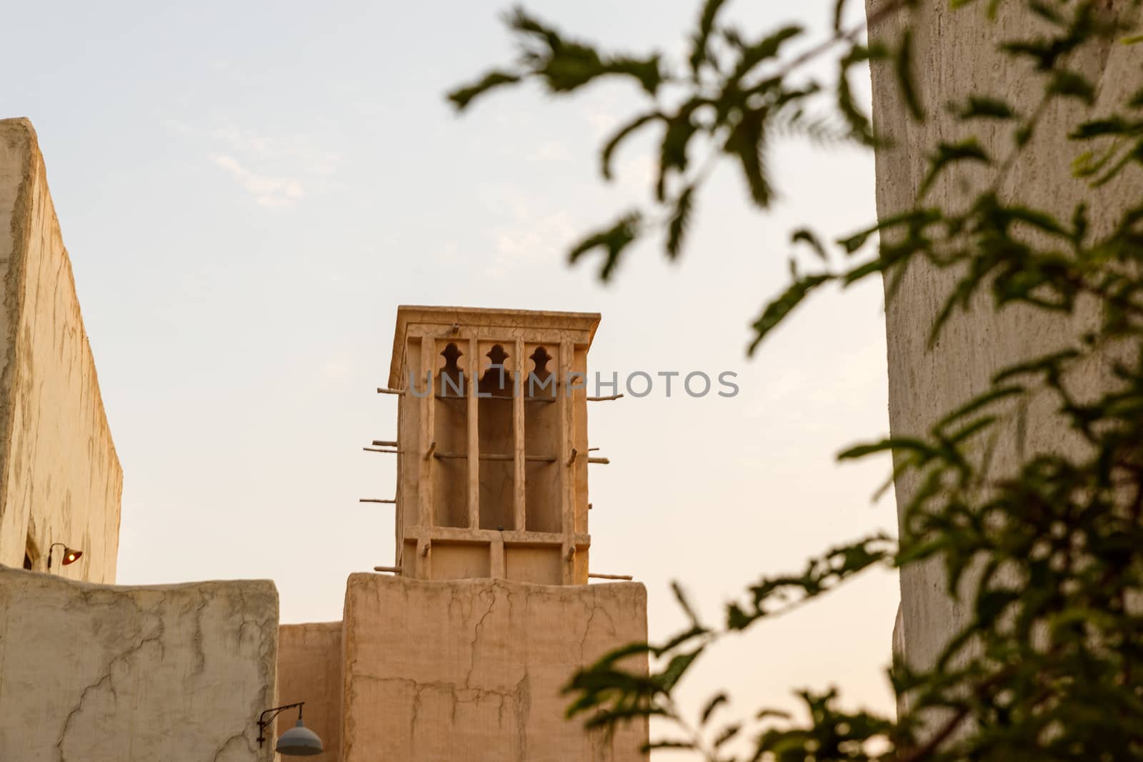Facade of an old Arabic house. Old arabian architecture. Old arabic house wind tower
