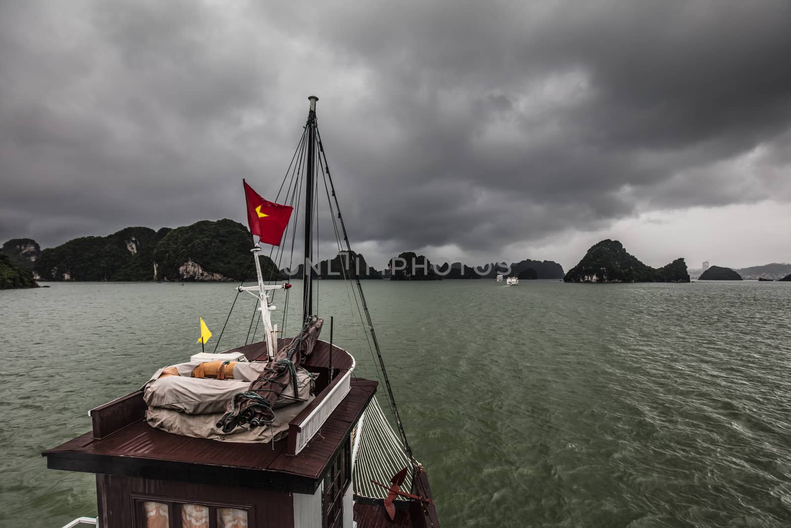 View throughout the islands of Ha Long Bay on a stormy summer's day in Ha Long Bay, Vietnam