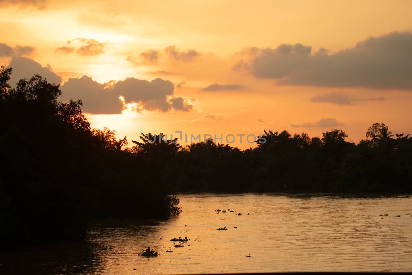 Mekong River Sunset in Vietnam by FiledIMAGE