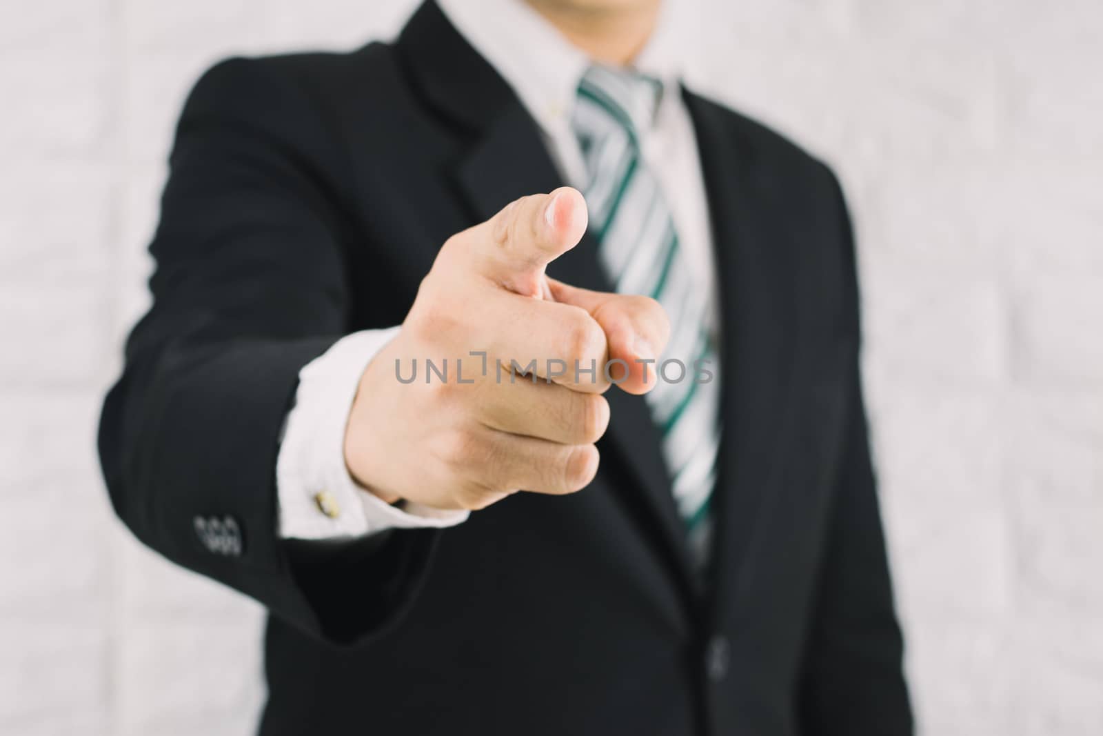 Business man pointing finger of command concept 