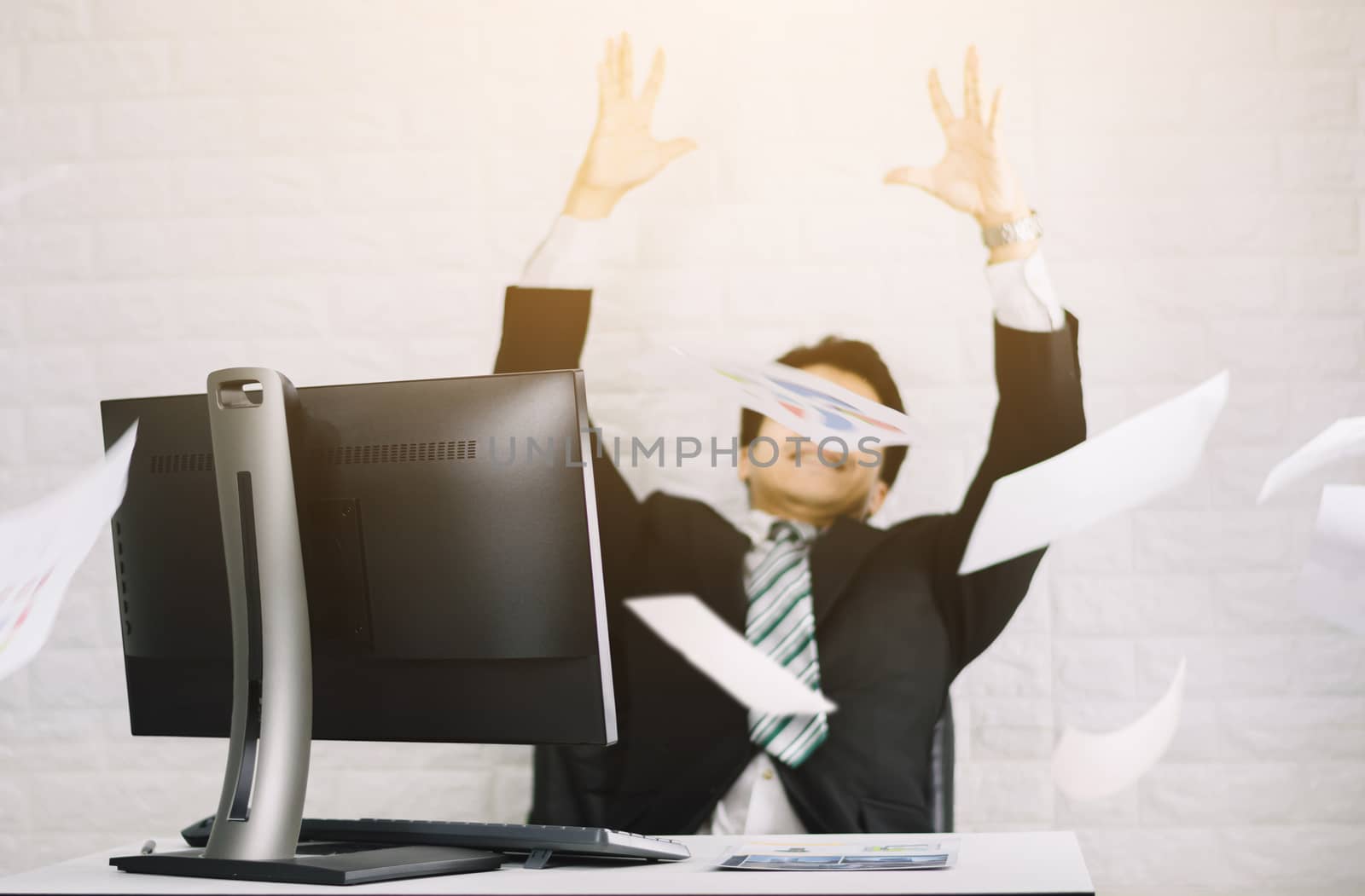 Happy business men throw documents Successful job