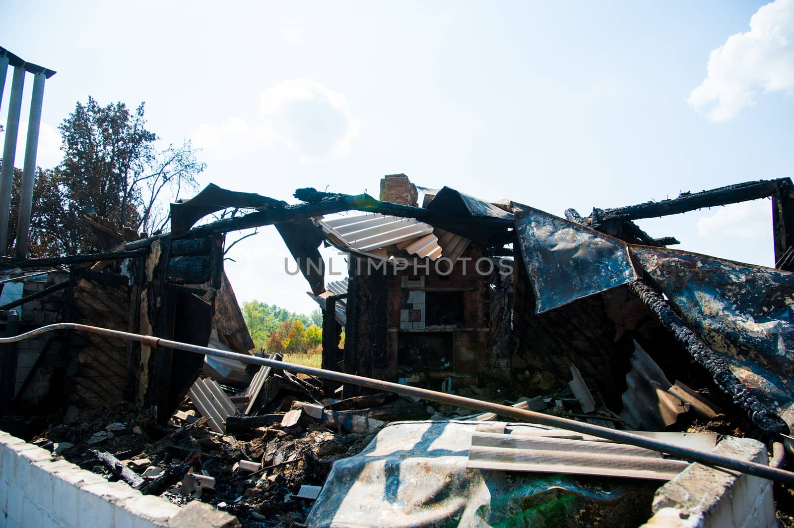 Ruins of house after big disaster - fire
