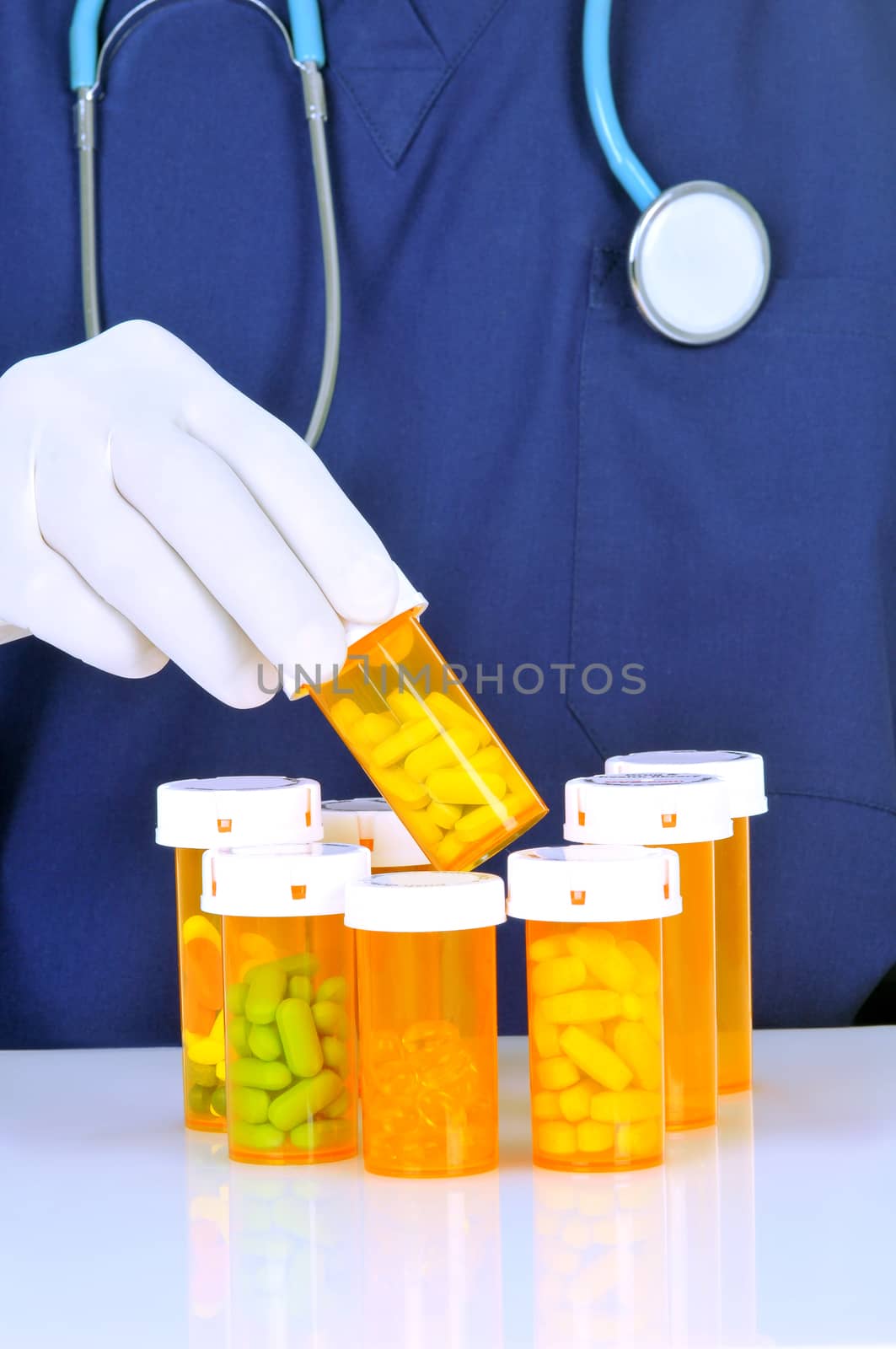 Doctor choosing prescription bottle by sCukrov