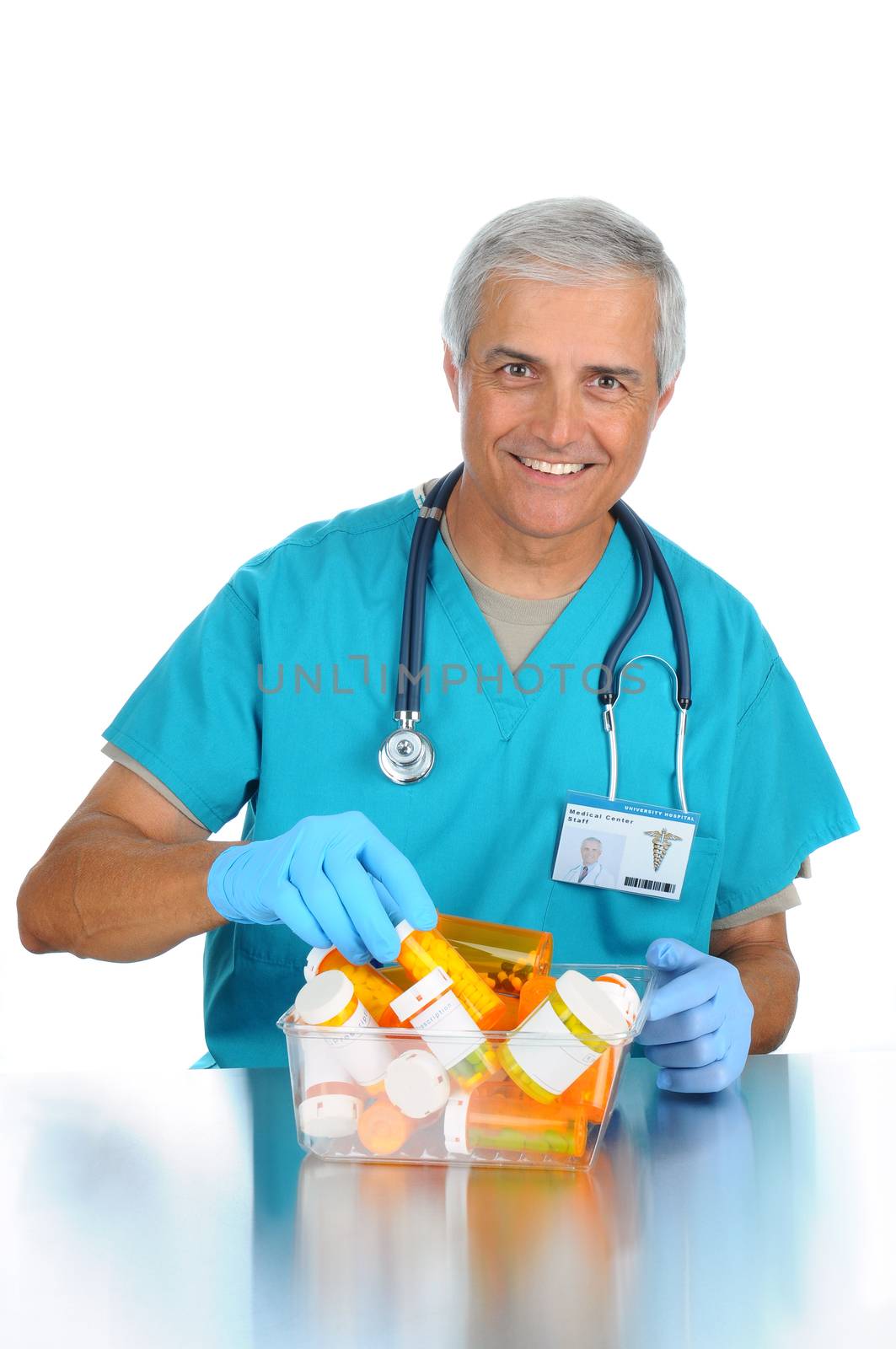 Doctor choosing prescription from bin by sCukrov